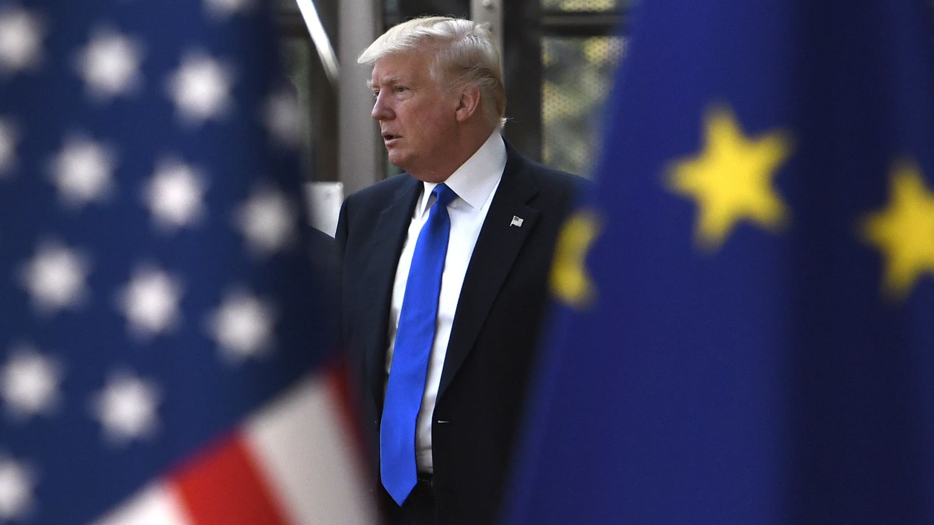 Top EU official says Europe is ready to respond “in an appropriate way” as Trump touts tariffs