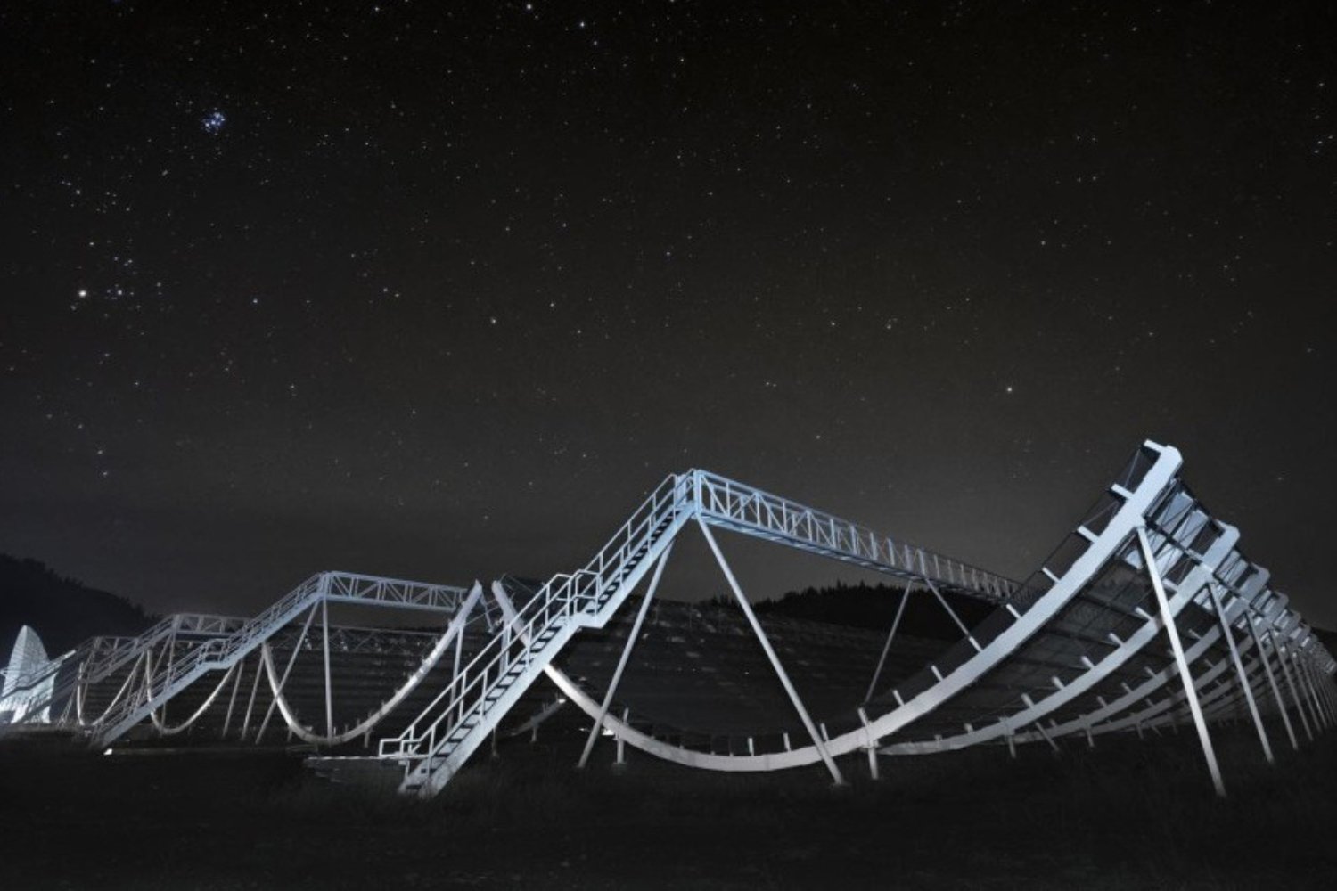 Mysterious Radio Bursts Traced to the Edge of an Old, Dying Galaxy