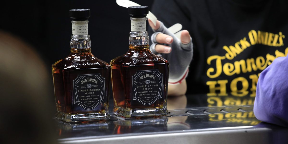 Jack Daniel’s parent Brown-Forman cut 12% of its workforce and closed a barrel-making plant in town.