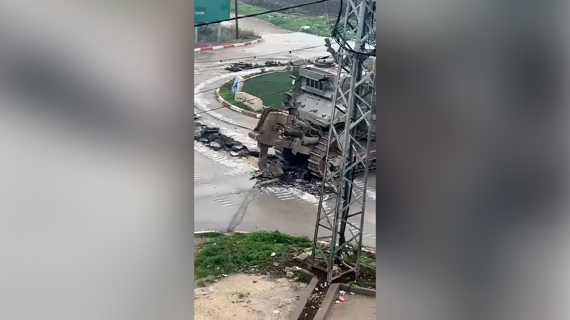 Israeli bulldozer destroy the road on the west bank of the occupied Jordan River