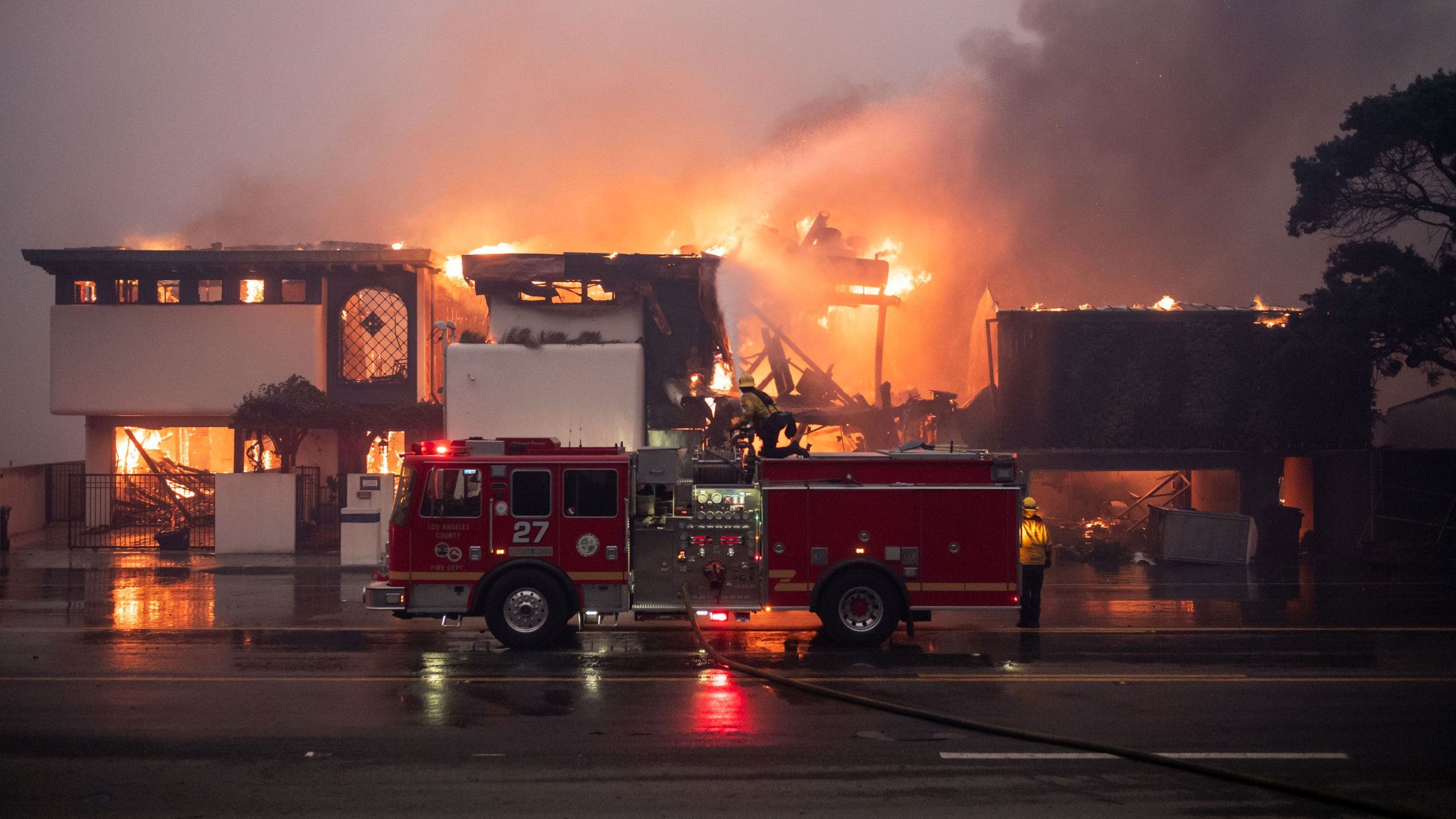 Photos capture Southern California wildfires burning homes and businesses