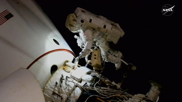 Stranded NASA astronaut changes pace on spacewalk after 7 months in orbit